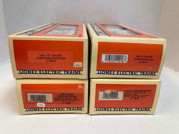Lionel Christmas Boxcar Lot of 4 (1991–1994) – 6-19913, 6-19918, 6-19922, 6-19929 – O Gauge