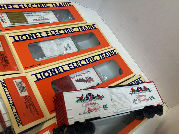 Lionel Christmas Boxcar Lot of 4 (1991–1994) – 6-19913, 6-19918, 6-19922, 6-19929 – O Gauge