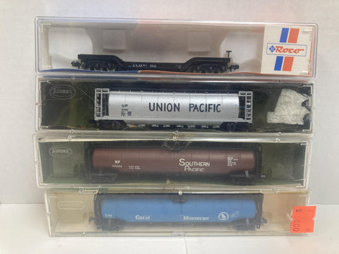 Jumbo Tanks & Depressed Center Car N Pack (Postage Stamp Trains Southern Pacific Jumbo Tank, PST UP 50' Center Flow Car, Minitrix Jumbo Tank Gt. N, Roco US Army Depressed Center (28153)