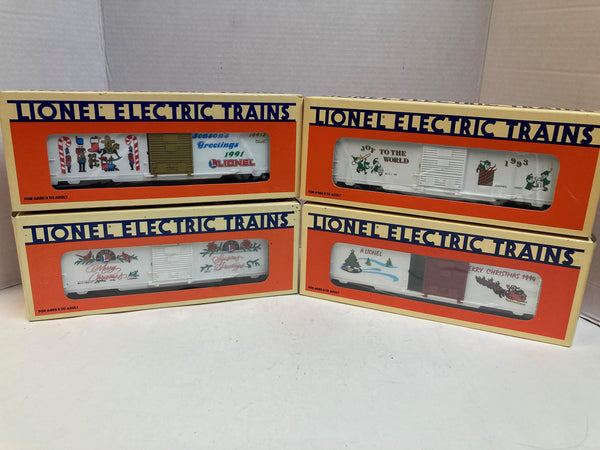 Lionel Christmas Boxcar Lot of 4 (1991–1994) – 6-19913, 6-19918, 6-19922, 6-19929 – O Gauge