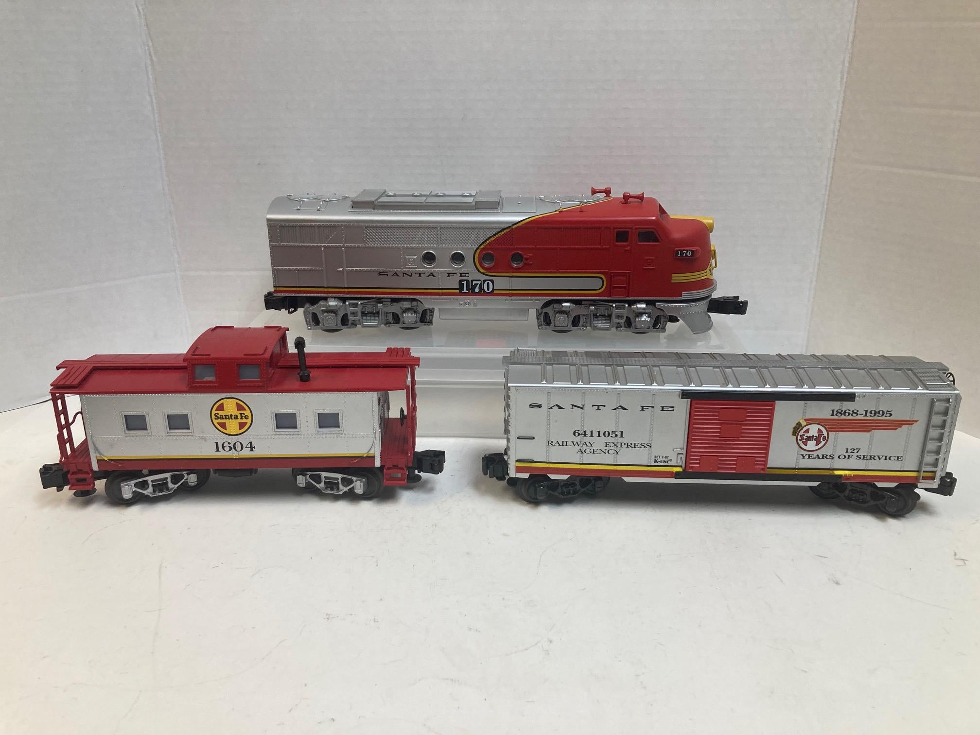 O Gauge Santa Fe Lot – Lionel 170 Loco, MTH Caboose 1604, K-Line Boxcar 6411051 – Red/Yellow/Grey